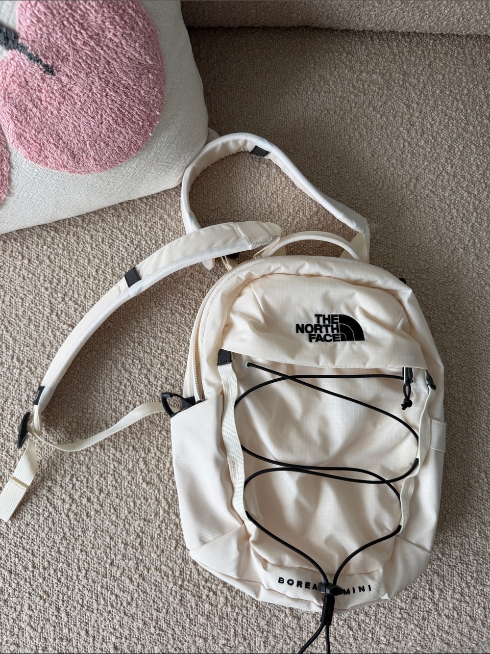 The North Face Mini Backpack in Cream with Black Accents